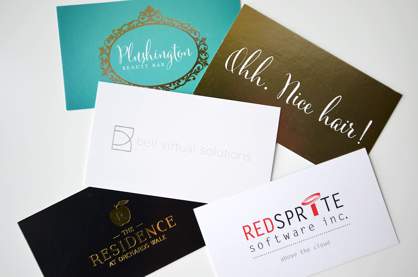 collection of business cards - White Canvas Design