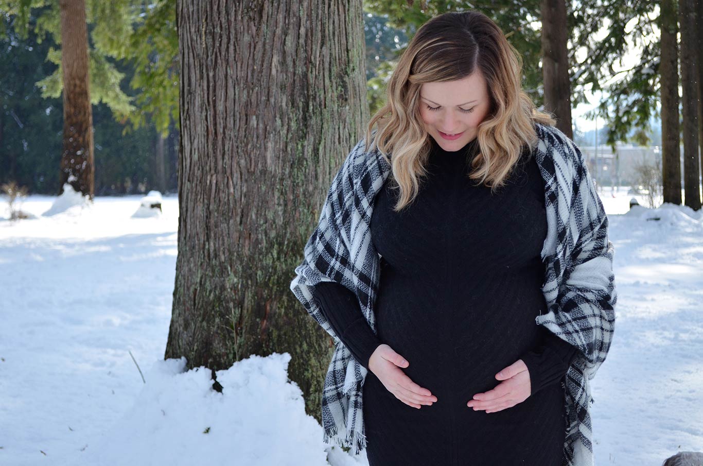 carly pregnant with riley outside in the snow - White Canvas Design