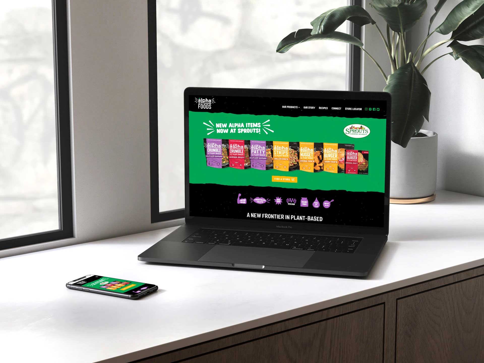 Alpha Foods website shown on a laptop and mobile - White Canvas Design