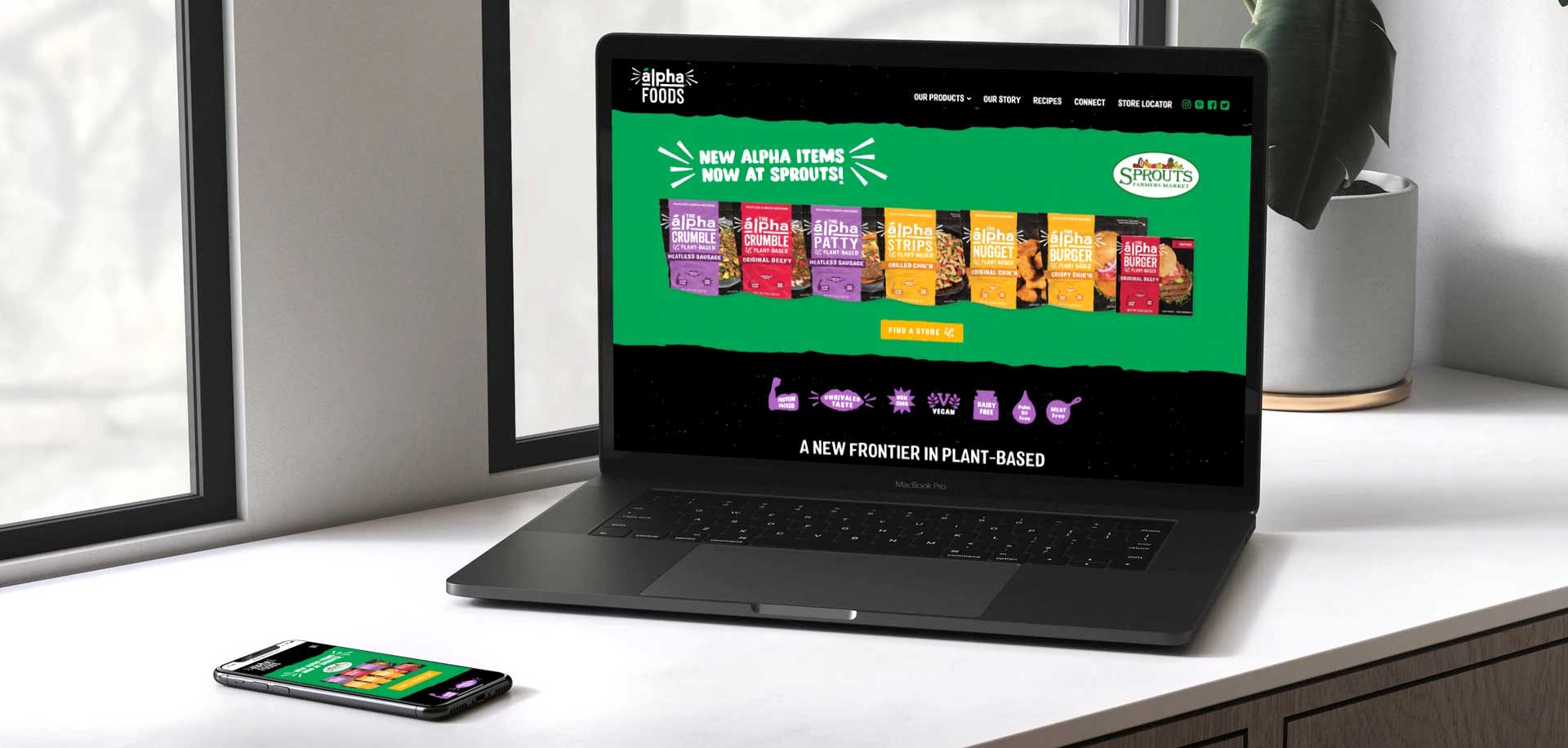 Alpha Foods homepage website shown on a laptop and mobile - White Canvas Design