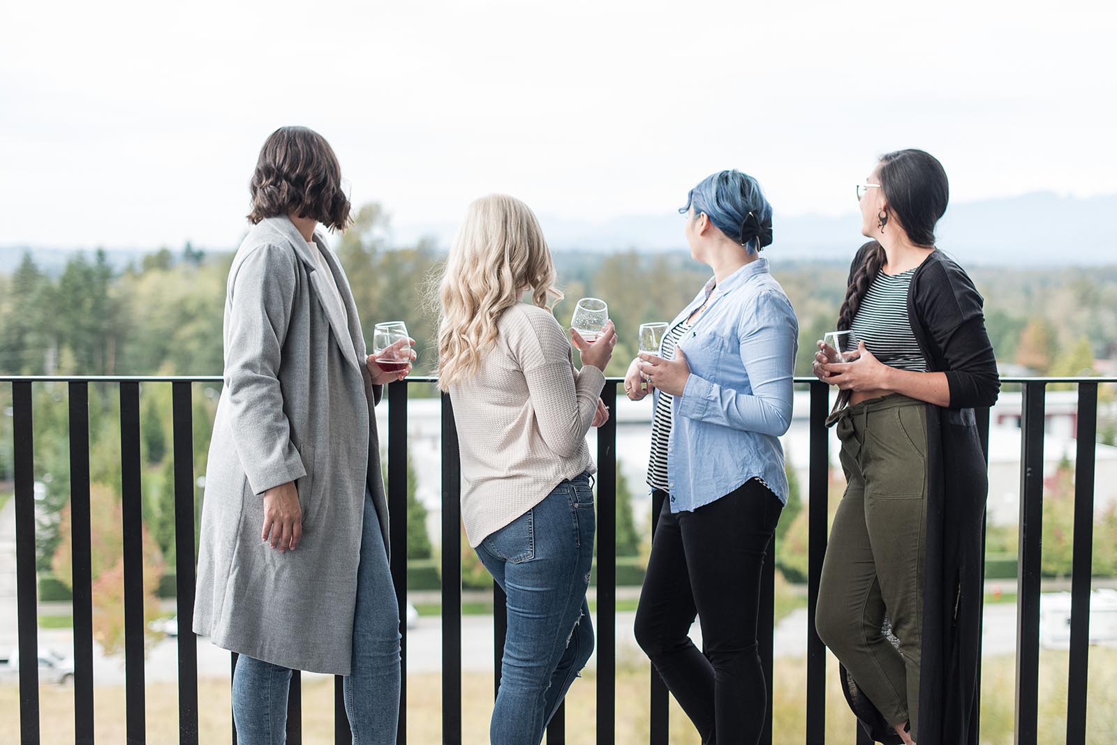 White Canvas team photo looking out at the mountain view - White Canvas Design