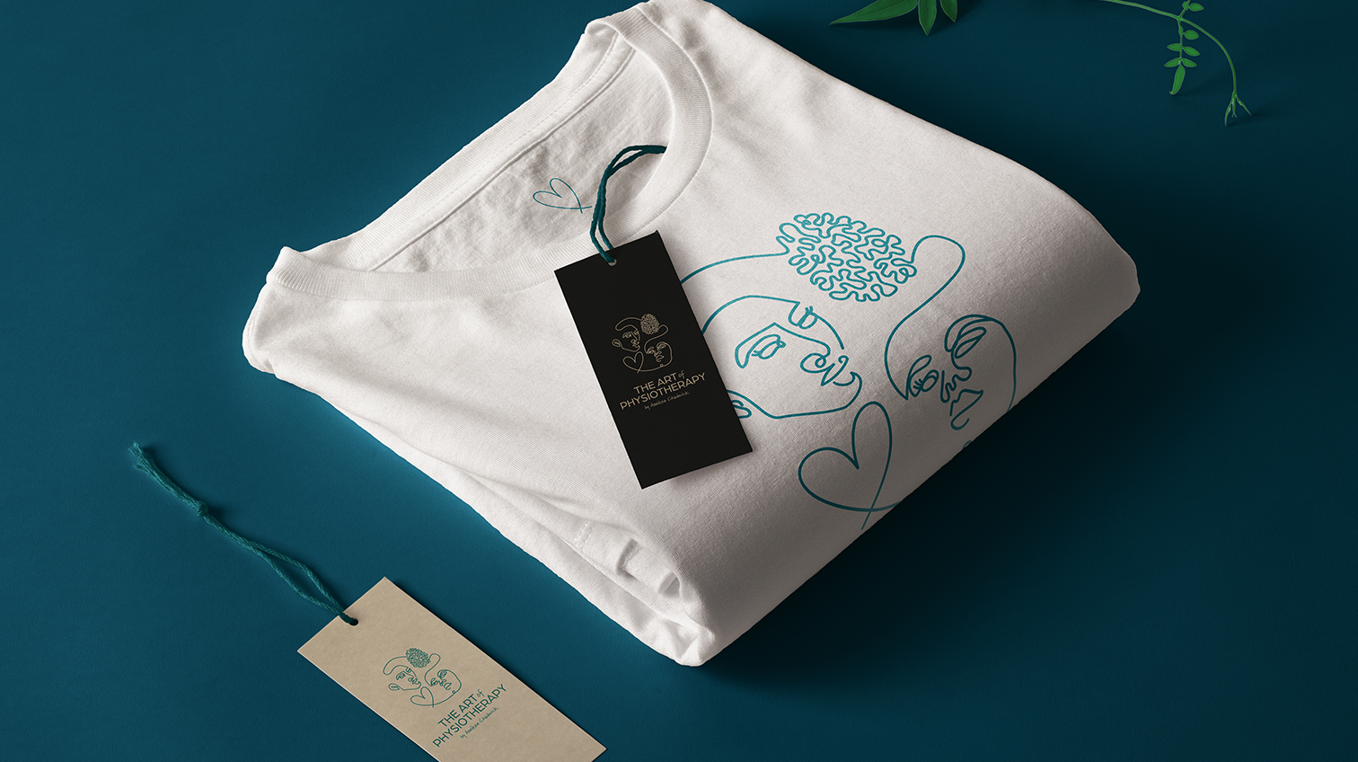 The Art of Physiotherapy folded t-shirt and clothing tag, with logo design - White Canvas Design