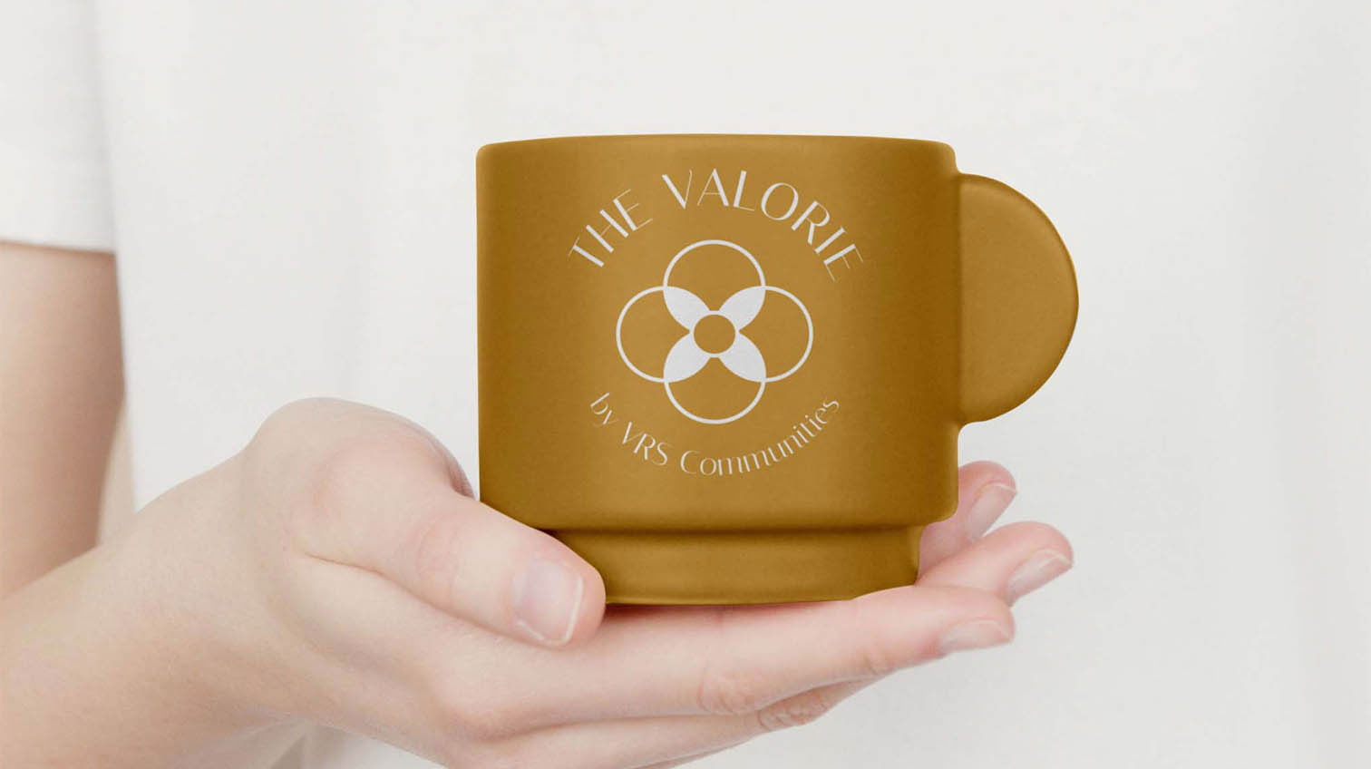 The Valorie logo and branding on a cup, by White Canvas Design