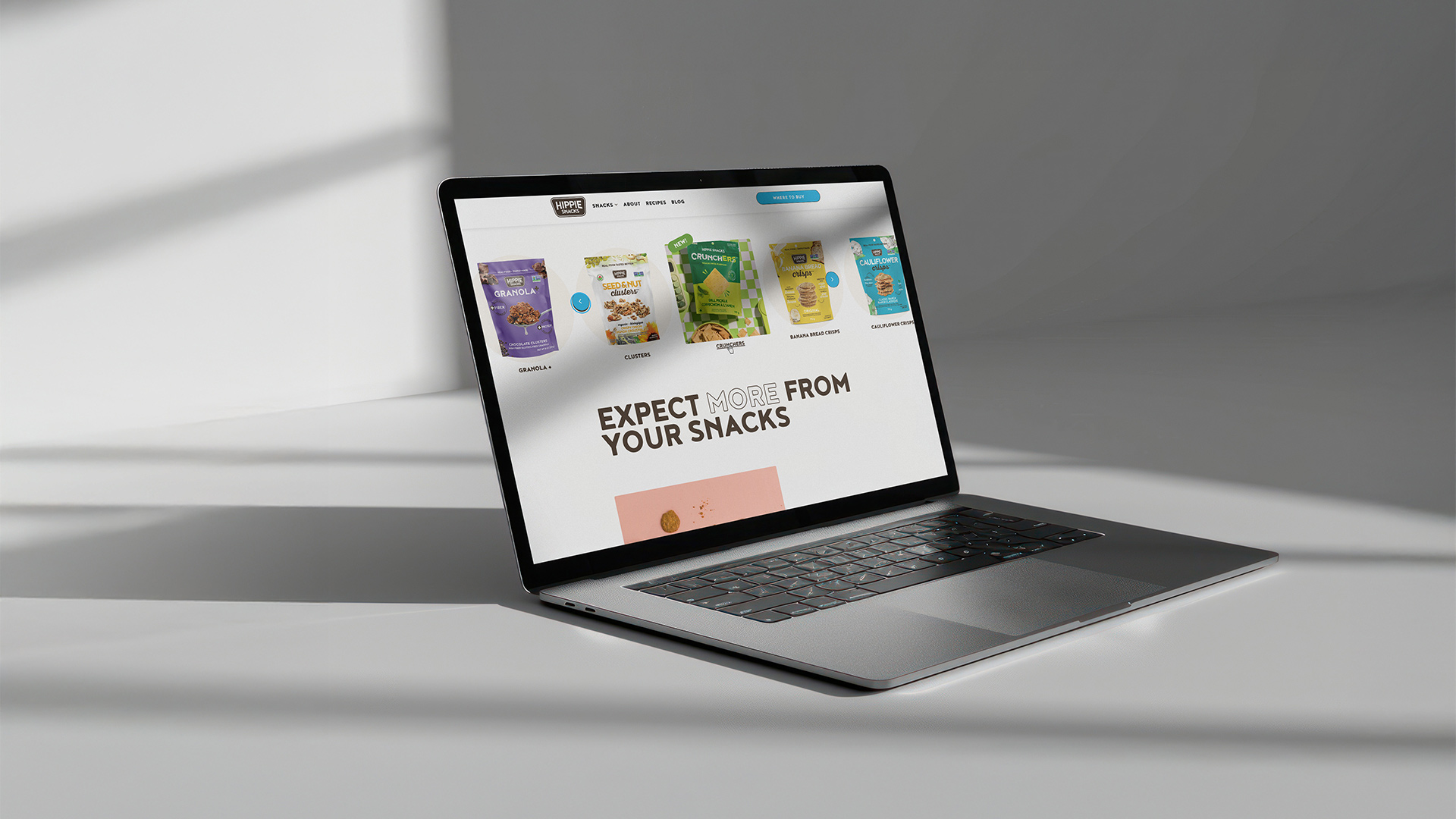 A view of the Hippie Snacks WordPress website on a laptop screen