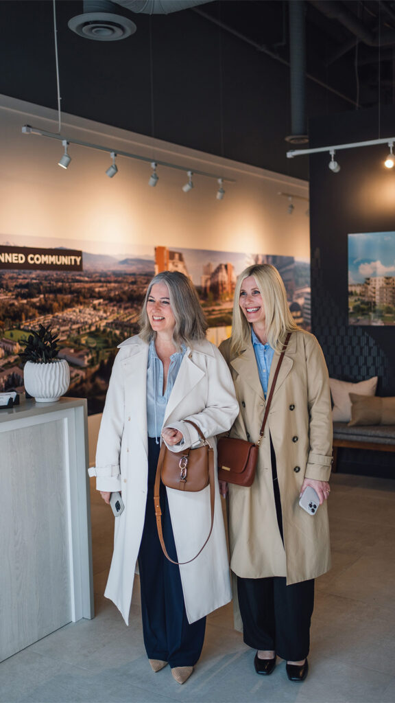Two women enjoying the Latimer heights showroom